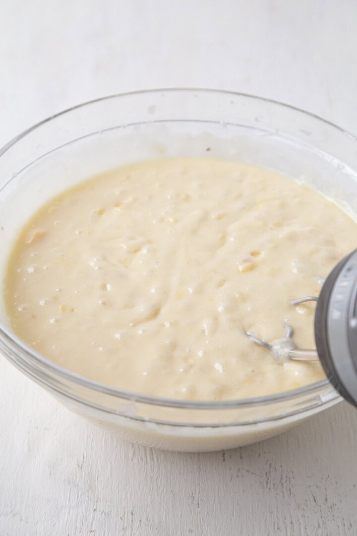 cake batter with pineapple in a glass bowl.