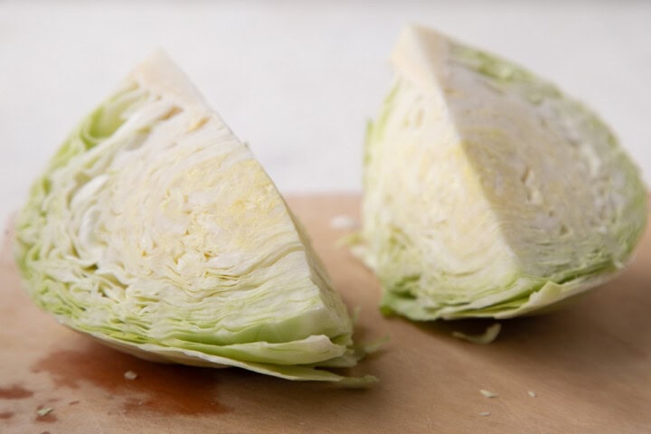 two pieces of quartered cabbage.