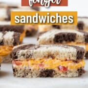 pimento cheese on marble rye, cut into mini finger sandwiches.