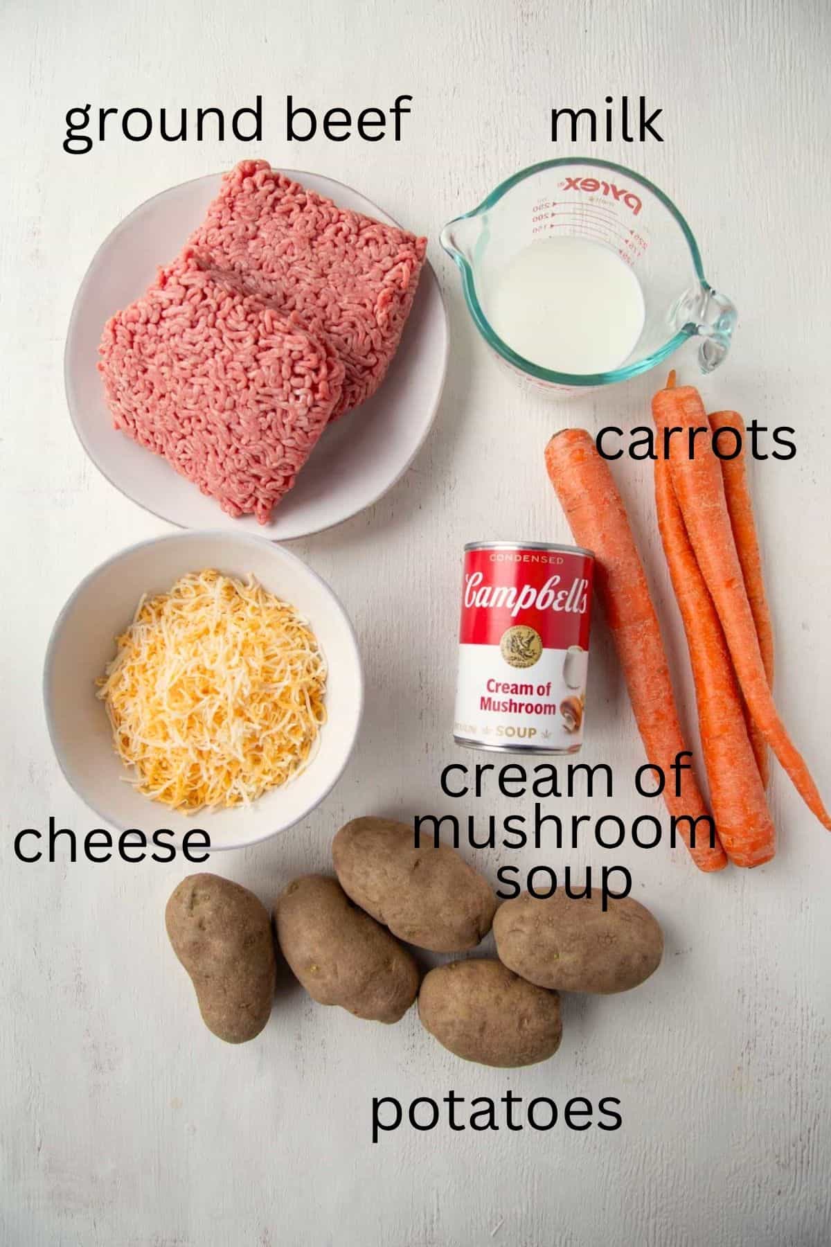 ground beef, potatoes, carrots, cream of mushroom soup, and other ingredients.