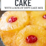 round yellow pineapple upside down cake topped with pineapple rings and maraschino cherries.