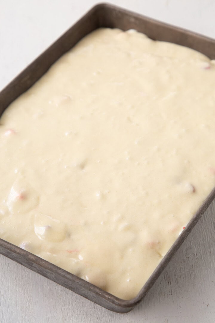 white cake batter in a baking dish.