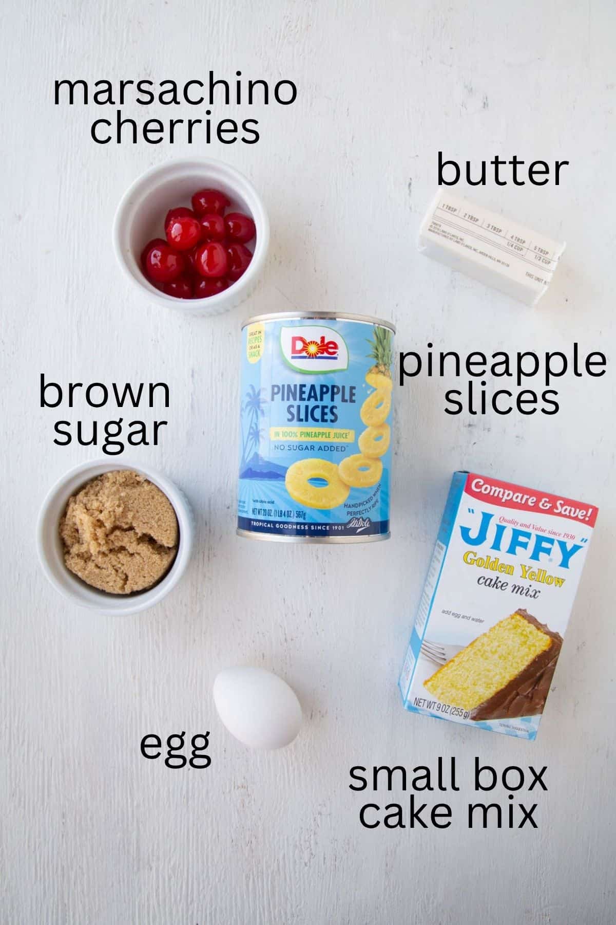 box of cake mix, pineapple rings, brown sugar, and other toppings.