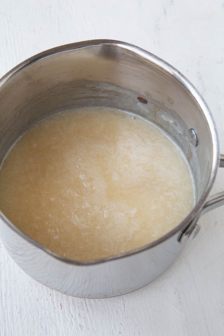 butter and evaporated milk mixed in a saucepan.