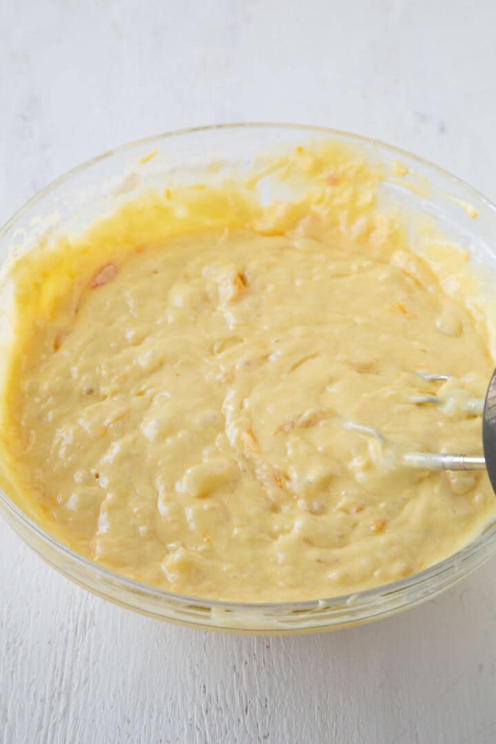 yellow cake batter in a glass bowl.