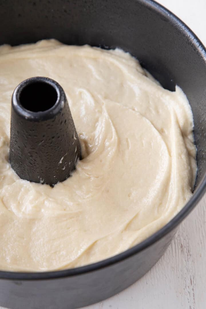 cake batter in a tube pan.