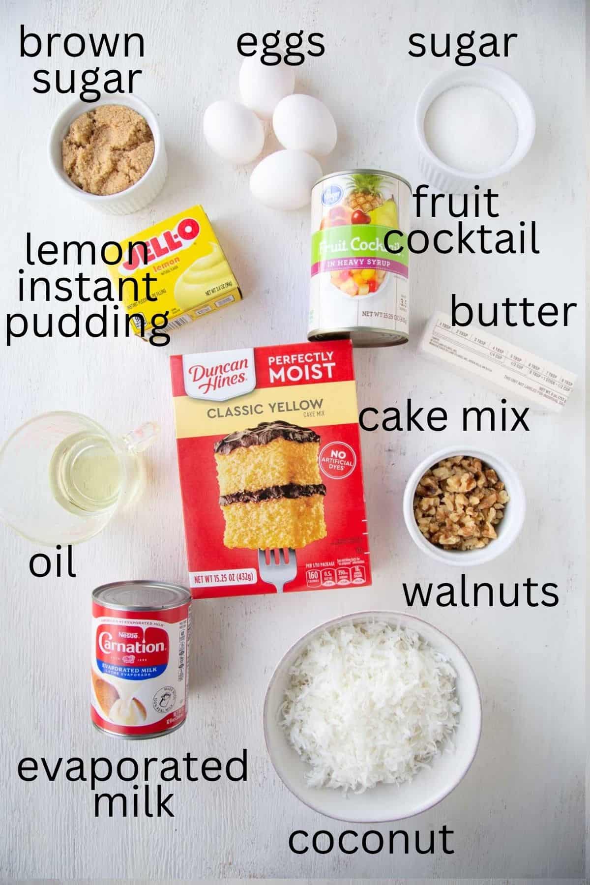 cake mix, lemon instant pudding, fruit cocktail, coconut, and other cake ingredients.