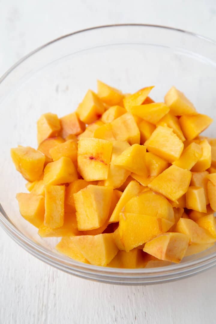 chopped fresh peaches in a bowl.