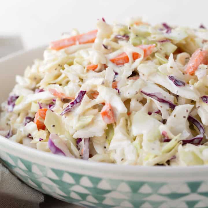 simple bowl of coleslaw with carrots and red cabbage in a mayo dressing.