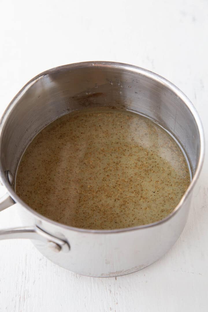 oil, vinegar, and sugar in a saucepan.