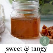 hot bacon salad dressing in a mason jar.