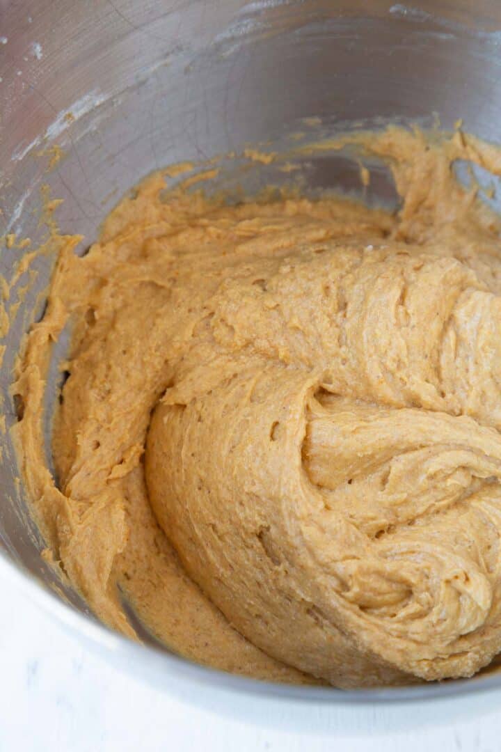 pumpkin bread batter in a metal bowl.